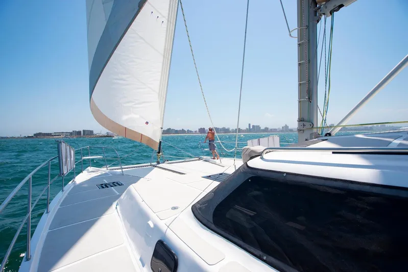 Barefeet Retreat Yacht Photos Pics Sailing on a 2020 Royal Cape Catamarans Majestic 570 in open waters.