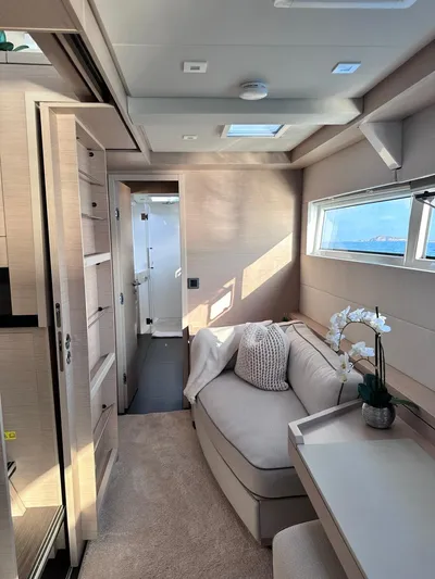  Yacht Photos Pics Luxurious interior of 2021 Lagoon 50 yacht with modern furnishings and natural light.
