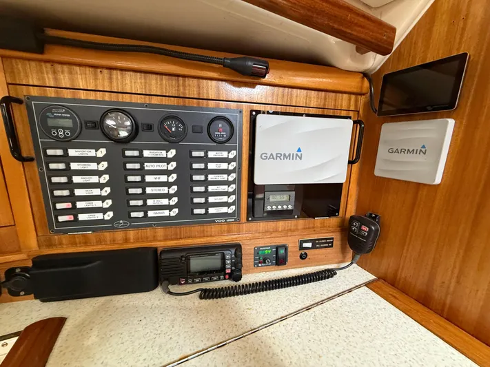 Mockingbird Yacht Photos Pics Control panel of a 2001 Dufour Gib'Sea 43 yacht with Garmin navigation equipment.