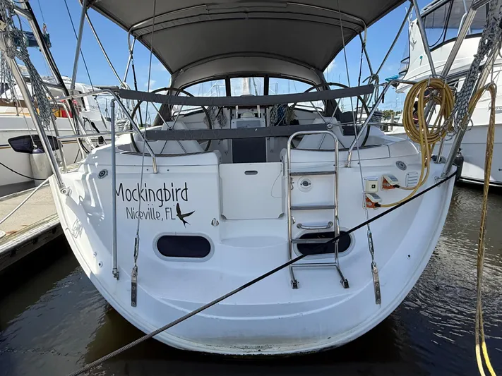 Mockingbird Yacht Photos Pics 2001 Dufour Gib'Sea 43 sailboat "Mockingbird" docked in Niceville, Florida marina.