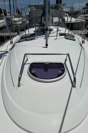 Mockingbird Yacht Photos Pics Deck view of 2001 Dufour Gib'Sea 43 sailboat in marina.