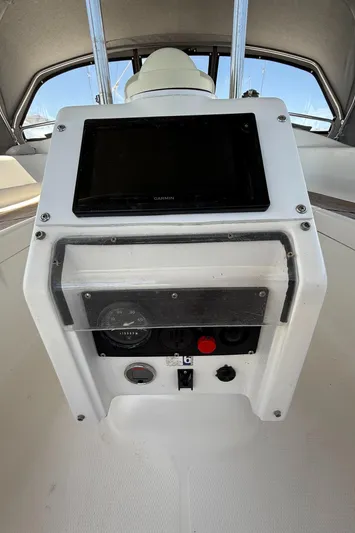 Mockingbird Yacht Photos Pics Control panel of 2001 Dufour Gib'Sea 43 sailboat with navigation equipment.