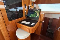 Luxurious Privilege 515 yacht interior with navigation desk and modern equipment, 2010 model.