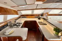 Luxurious kitchen interior on 2010 Privilege 515 yacht with modern amenities and sleek design.