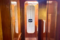 Luxurious wooden interior of 2010 Privilege 515 yacht with modern shower.