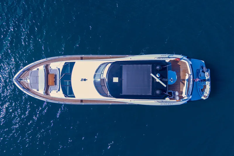  Yacht Photos Pics Overhead view of 2017 Sunseeker 86 Yacht on blue ocean water.