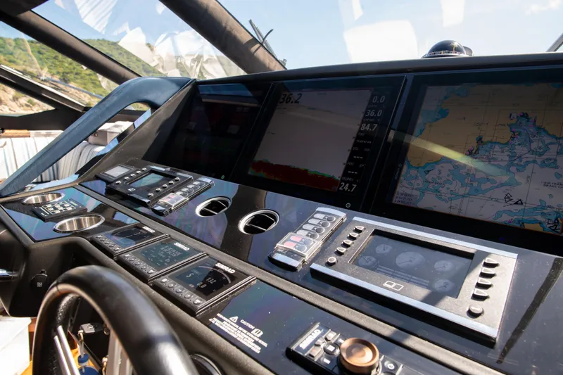  Yacht Photos Pics Cockpit of 2017 Sunseeker 86 Yacht with advanced navigation systems and controls.