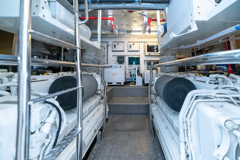  Yacht Photos Pics Engine room of 2017 Sunseeker 86 Yacht, showcasing dual engines and control systems.
