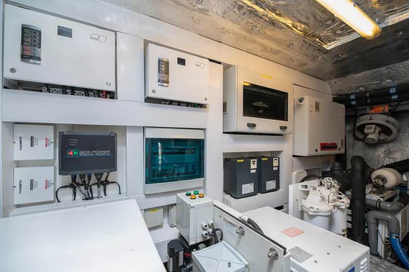  Yacht Photos Pics Engine room of 2017 Sunseeker 86 Yacht with electrical control panels and equipment.