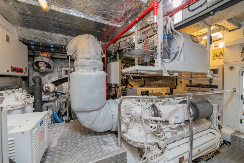  Yacht Photos Pics Engine room of 2017 Sunseeker 86 Yacht, showcasing complex machinery and equipment.