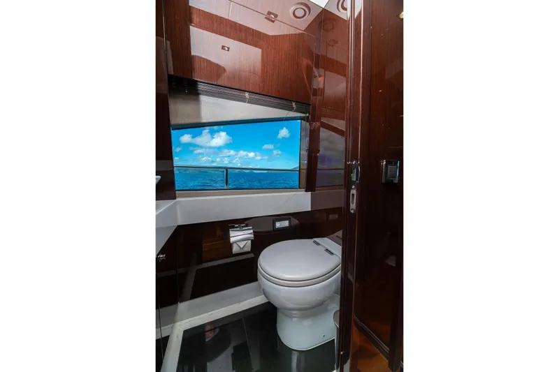  Yacht Photos Pics Luxurious bathroom on 2017 Sunseeker 86 Yacht with ocean view window.