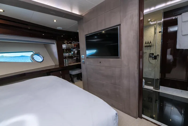  Yacht Photos Pics Luxurious interior of 2017 Sunseeker 86 Yacht with bedroom and ensuite bathroom.