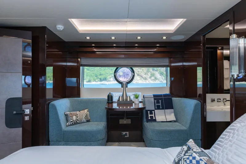  Yacht Photos Pics Luxurious interior of 2017 Sunseeker 86 Yacht with elegant seating and scenic window view.