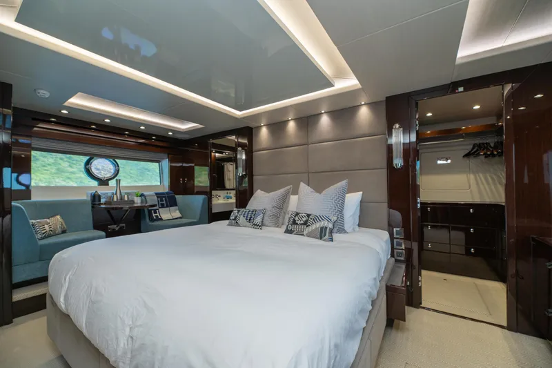  Yacht Photos Pics Luxurious 2017 Sunseeker 86 Yacht bedroom with modern decor and elegant furnishings.