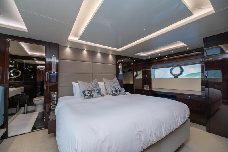  Yacht Photos Pics Luxurious bedroom interior of 2017 Sunseeker 86 Yacht with modern design and elegant lighting.