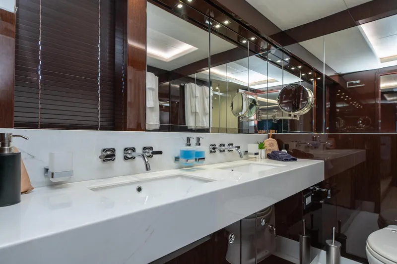  Yacht Photos Pics Luxurious bathroom on 2017 Sunseeker 86 Yacht with modern fixtures and elegant design.