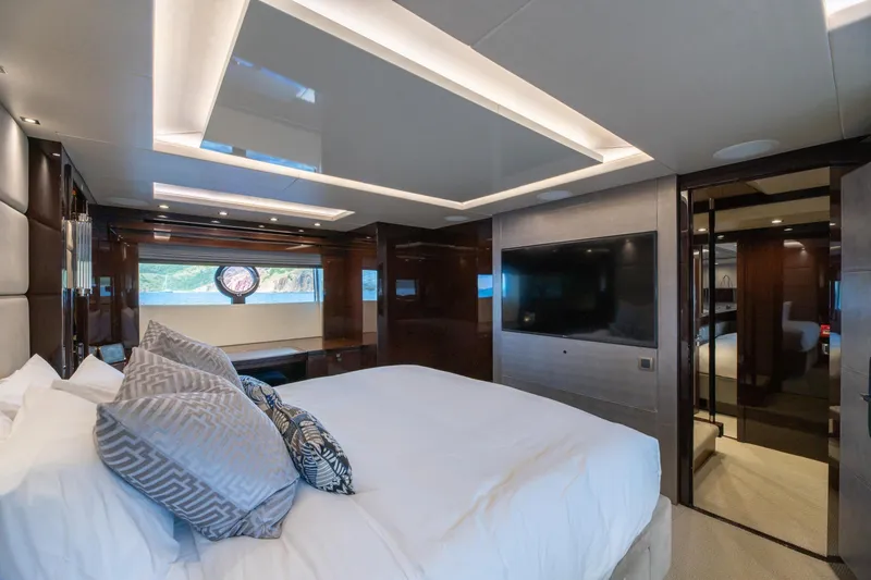  Yacht Photos Pics Luxurious bedroom interior of 2017 Sunseeker 86 Yacht with modern design and large TV.