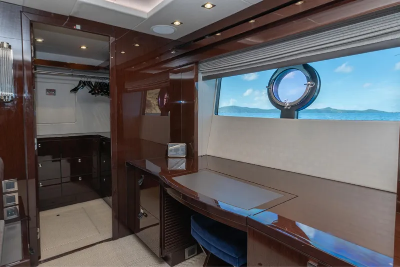  Yacht Photos Pics Luxurious interior of 2017 Sunseeker 86 Yacht with ocean view through porthole.