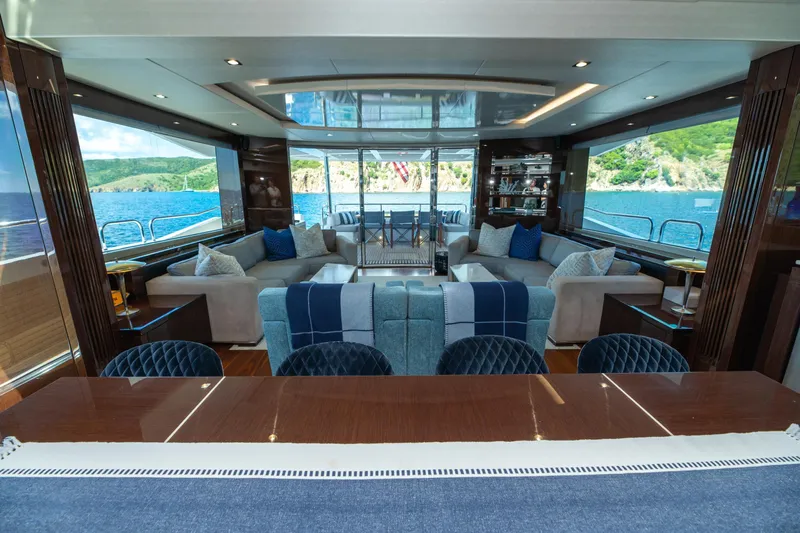  Yacht Photos Pics Luxurious interior of 2017 Sunseeker 86 Yacht with elegant seating and scenic ocean views.