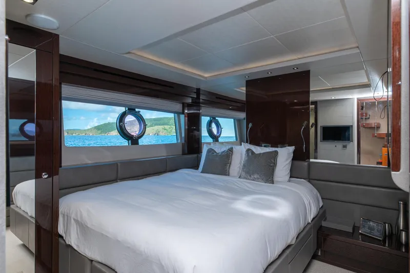  Yacht Photos Pics Luxurious bedroom interior of 2017 Sunseeker 86 Yacht with ocean view.