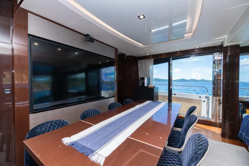 Yacht Photos Pics Luxurious interior of 2017 Sunseeker 86 Yacht with ocean view and elegant dining area.