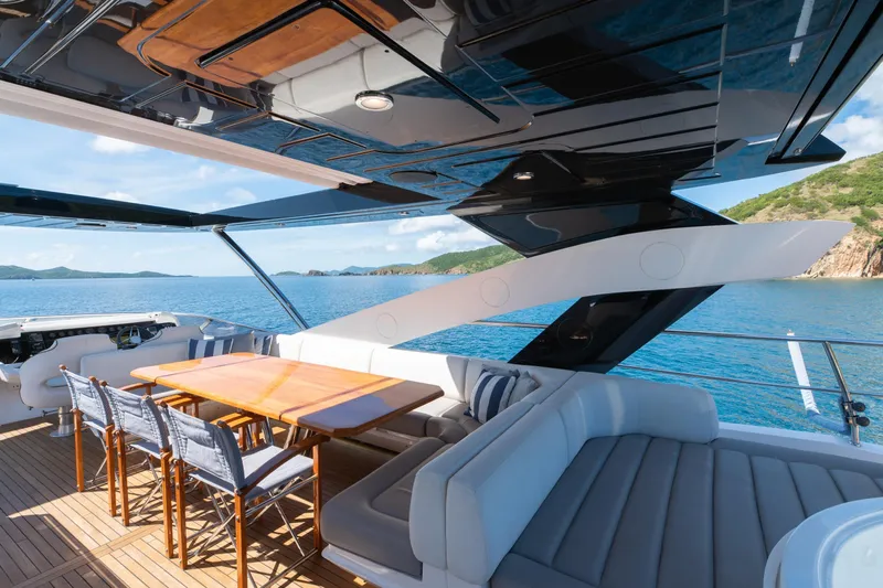  Yacht Photos Pics Luxurious 2017 Sunseeker 86 Yacht deck with elegant seating and ocean view.