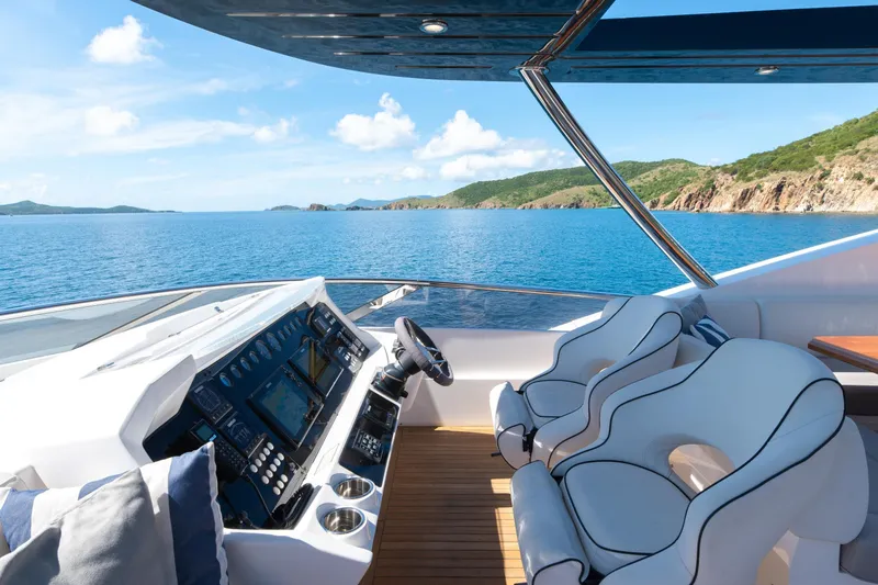  Yacht Photos Pics Luxurious 2017 Sunseeker 86 Yacht helm with ocean view and plush seating.