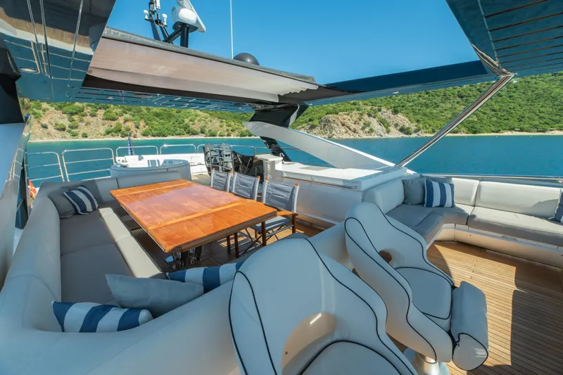  Yacht Photos Pics Luxurious Sunseeker 86 Yacht 2017 with elegant outdoor seating and scenic ocean view.