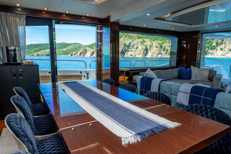  Yacht Photos Pics Luxurious interior of 2017 Sunseeker 86 Yacht with ocean view and elegant dining area.