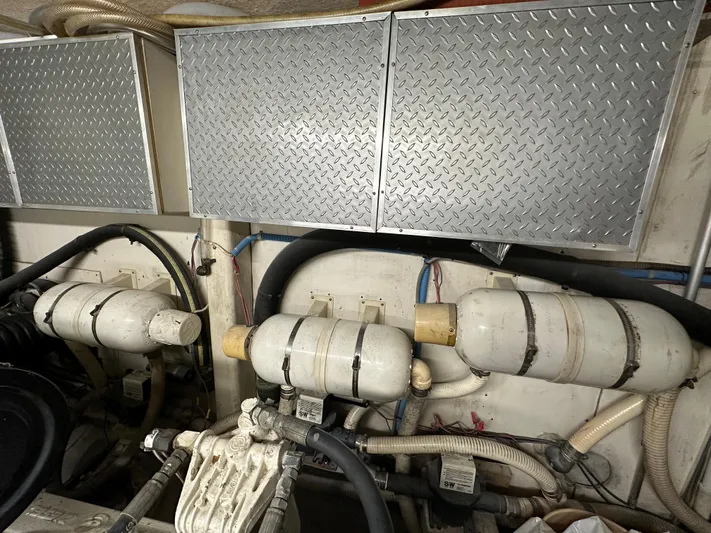 The Jobsite Yacht Photos Pics Engine room of a 1988 Viking Motor Yacht with mechanical components.