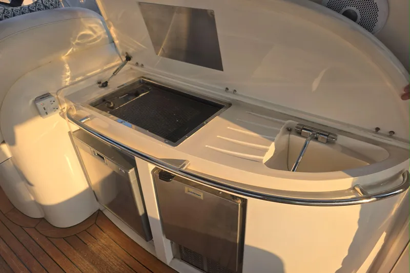 Kings Corner Yacht Photos Pics Sunseeker Camargue 44 yacht kitchen area with grill and sink, 2001 model.