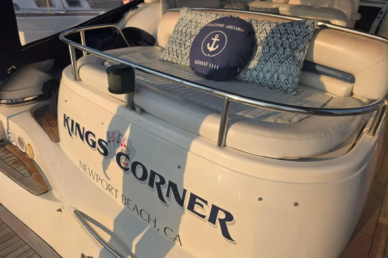 Kings Corner Yacht Photos Pics Sunseeker Camargue 44 yacht, 2001 model, docked in Newport Beach, CA, with cushioned seating.