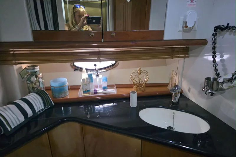 Kings Corner Yacht Photos Pics Luxurious bathroom interior of 2001 Sunseeker Camargue 44 yacht with elegant fixtures.