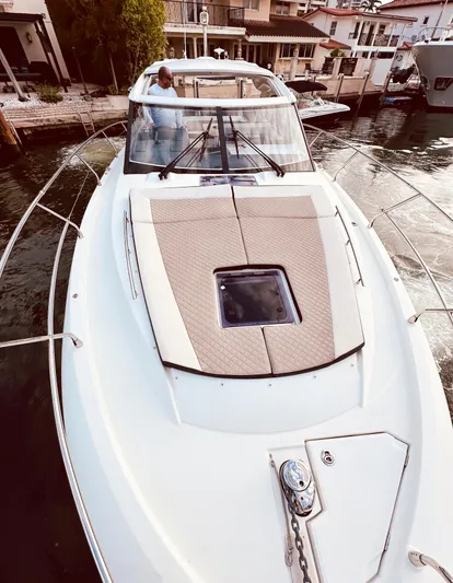 Chichochu Yacht Photos Pics 2017 Jeanneau Leader 40 yacht docked, featuring sleek design and spacious deck.