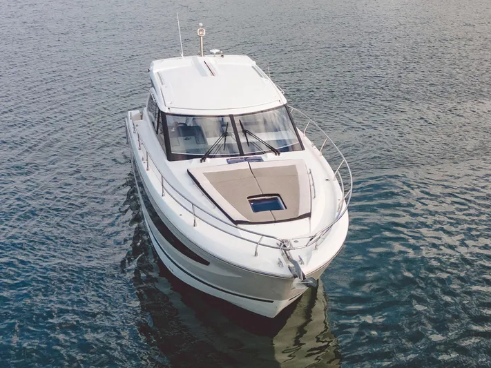 Chichochu Yacht Photos Pics 2017 Jeanneau Leader 40 yacht on calm water, aerial view.