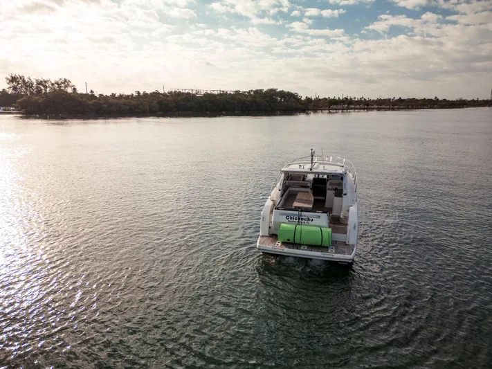 Chichochu Yacht Photos Pics 2017 Jeanneau Leader 40 yacht on calm water under a partly cloudy sky.