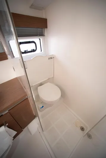 Chichochu Yacht Photos Pics Bathroom interior of 2017 Jeanneau Leader 40 yacht, featuring modern fixtures and compact design.