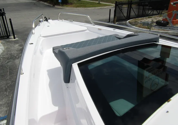  Yacht Photos Pics 2024 Axopar 37 Sun Top boat deck with sleek design and modern features.