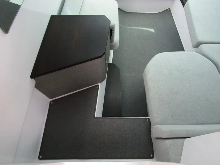  Yacht Photos Pics 2024 Axopar 37 Sun Top interior with modern seating and sleek design.