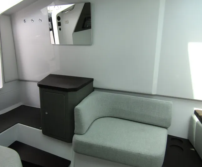  Yacht Photos Pics Interior of 2024 Axopar 37 Sun Top, featuring modern seating and sleek design.