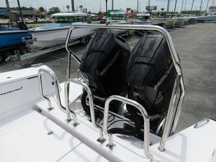  Yacht Photos Pics 2024 Axopar 37 Sun Top with dual Mercury outboard engines, docked in a marina.