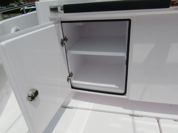  Yacht Photos Pics Open storage compartment on 2024 Axopar 37 Sun Top boat.