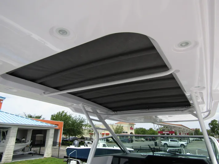  Yacht Photos Pics 2024 Axopar 37 Sun Top boat roof detail with retractable sunshade.
