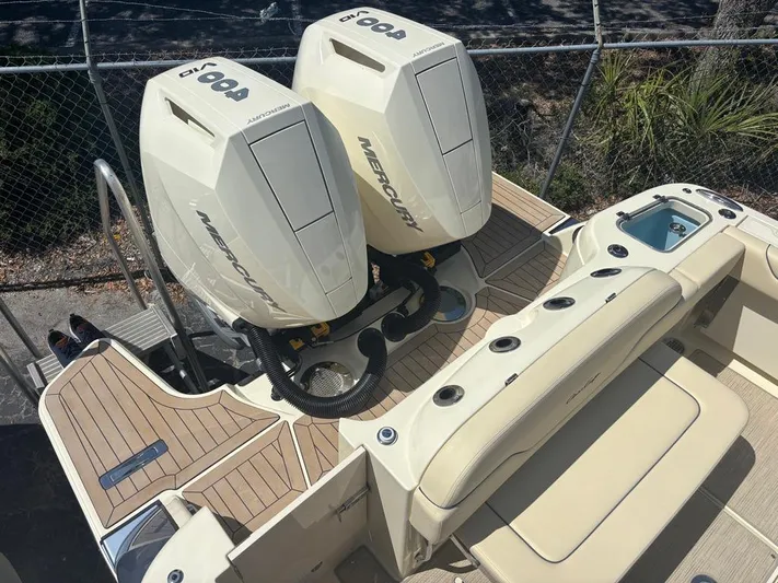  Yacht Photos Pics 2025 Chris-Craft Calypso 32 with twin Mercury engines, featuring a spacious deck layout.