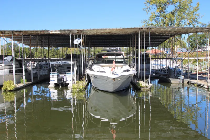  Yacht Photos Pics 2001 Sea Ray 460 Sundancer docked in a covered marina.