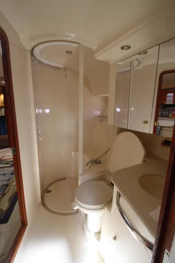  Yacht Photos Pics Luxurious bathroom in 2001 Sea Ray 460 Sundancer yacht with shower and toilet.