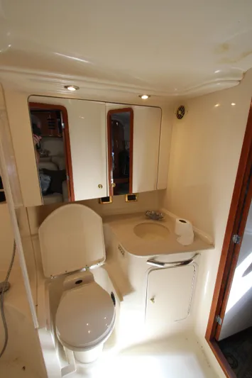  Yacht Photos Pics Luxurious bathroom in 2001 Sea Ray 460 Sundancer yacht with modern fixtures.