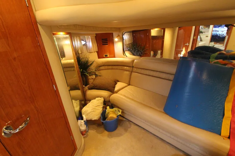 Yacht Photos Pics Interior of 2001 Sea Ray 460 Sundancer yacht with beige seating and decor.