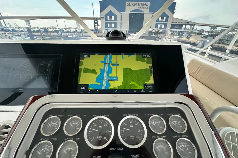 Loca Louise Yacht Photos Pics 2002 Hatteras 50 Convertible Sportfish dashboard with navigation and control gauges at Surfside Marina.