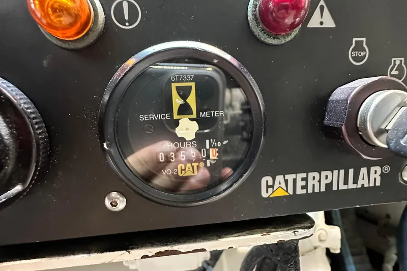 Loca Louise Yacht Photos Pics Caterpillar service meter on 2002 Hatteras 50 Convertible Sportfish, showing 356 hours.